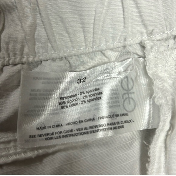 🔥NWT:FRAYED JEANS White Pocketed Fringed Baggy Elastic Waist High Waist Shorts - Picture 10 of 10